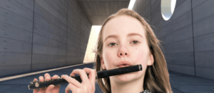A girl playing the piccolo