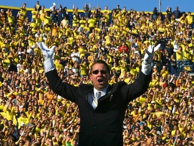 A marching band director leading the band