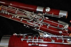 Bassoon parts laying on a floor